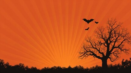 Silhouette of a bare tree and flying birds against a vibrant orange sunset sky with dark horizon line
