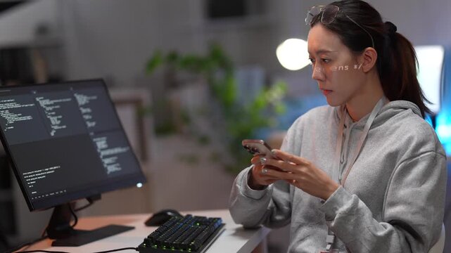 A female software developer smiles after successfully debugging a complex script. She works in a high-tech environment, coding on a mechanical keyboard with RGB backlighting.