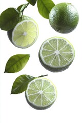 Fresh green limes with bright green leaves isolated on white background showing whole fruits and halves displaying juicy segments