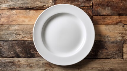 White ceramic plate with smooth rim on aged wooden planks