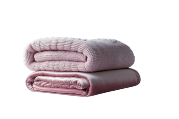 Two soft pink folded blankets on a black background