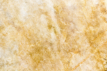 full frame of yellow sepia marble rock with rough surface texture for vintage background