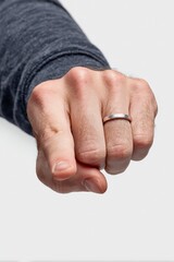 Fototapeta premium Close-up of hand wearing a simple ring