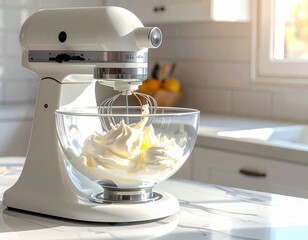 A high-speed hand mixer whipping cream in a glass bowl.