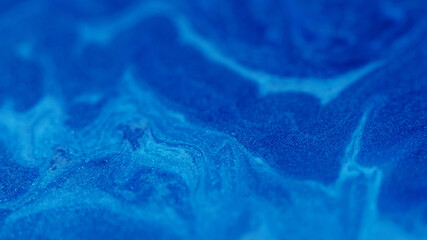 Shimmer mix. Acrylic enamel. Defocused blue color marble paint water fluid texture floating on abstract art wet creative background.