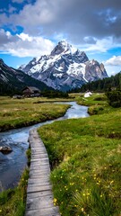 Obraz premium Mountain valley with wooden bridge