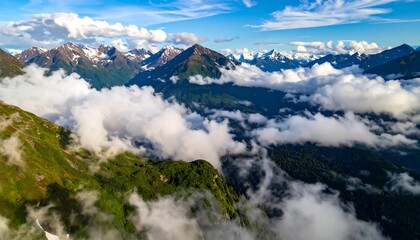 Majestic mountain range shrouded in clouds