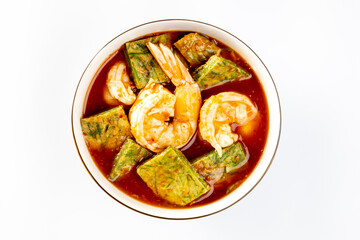 Shrimp Sour Soup with Acacia (Cha-om)  on a white background