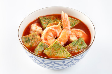 Shrimp Sour Soup with Acacia (Cha-om)  on a white background