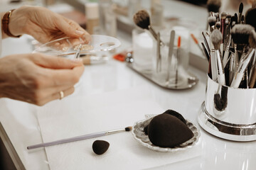 Makeup artist takes foundation from her desk