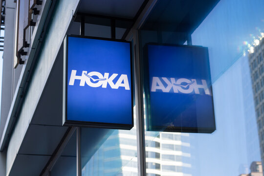Shanghai, China - July 30, 2024: HOKA sign is seen at one of its stores in Shanghai, China. HOKA is a sportswear company that designs and markets performance footwear and apparel.