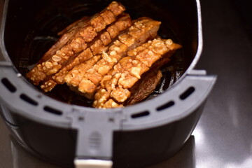 Crispy fried pork on white plate, Delicious glazed pork belly with crispy skin, Crispy Pork