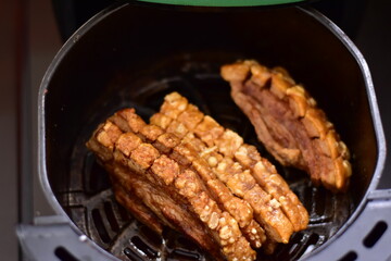 Crispy fried pork on white plate, Delicious glazed pork belly with crispy skin, Crispy Pork