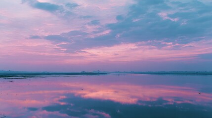 Obraz premium Pastel Sunset Clouds Mirrored in a Placid River