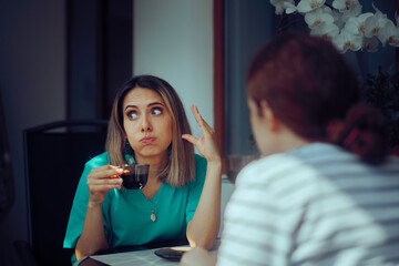 Woman Complaining to her Friend about Chit Chatting too Much. Busy lady complaining about her sister being to talkative and oversharing
