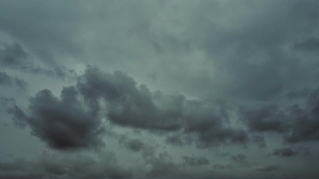 Timelapse of dark storm clouds gathering in the sky