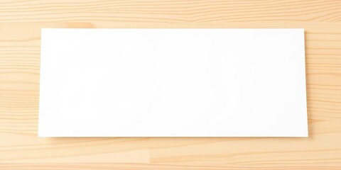 Naklejka premium Blank white paper folder mockup on light wood background, slightly angled, design element, folder mockup