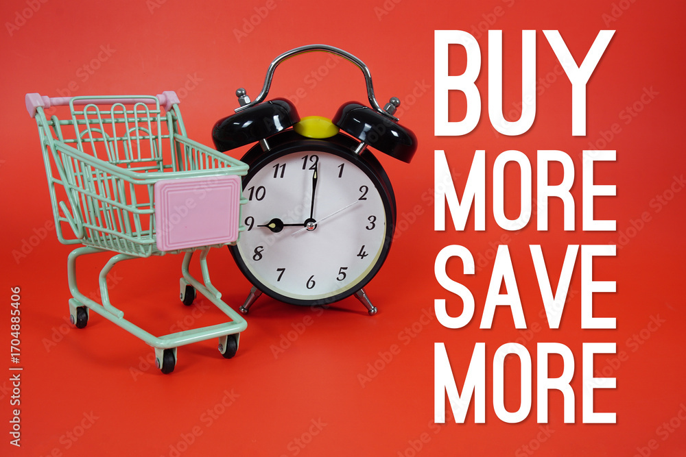 Poster buy more save more text with trolley shopping cart and alarm clock on red background