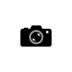Simple black silhouette icon of a digital camera.