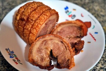 Golden brown pork belly, served thick or thin — a celebration of texture and taste