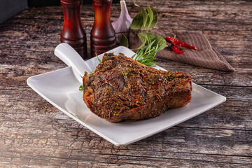 Baked beef steak on the bone