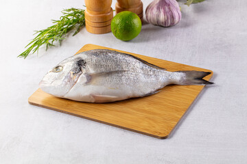 Raw fresh uncooked dorada fish