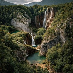 Obraz premium Cascading Waterfalls in Lush Forest Landscape