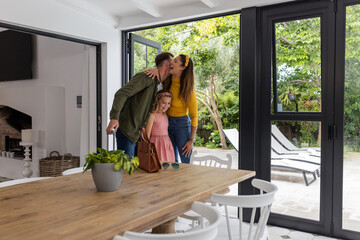 Family enjoying quality time together at home, sharing loving moment