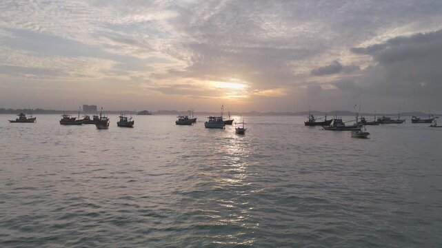 Multi day Fishing Boats at Sunrise - Drone Push-In and Crane Up at Weligama bay