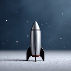 Miniature silver rocket on a starry background in space.