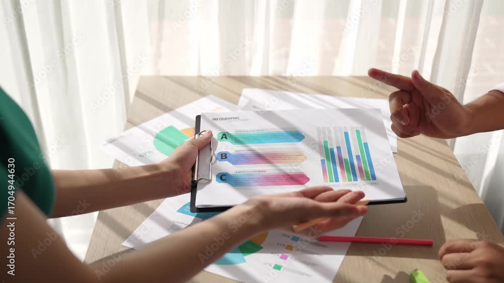 Poster startup company employee work together, analyze colorful bi dashboard paper with financial data repo