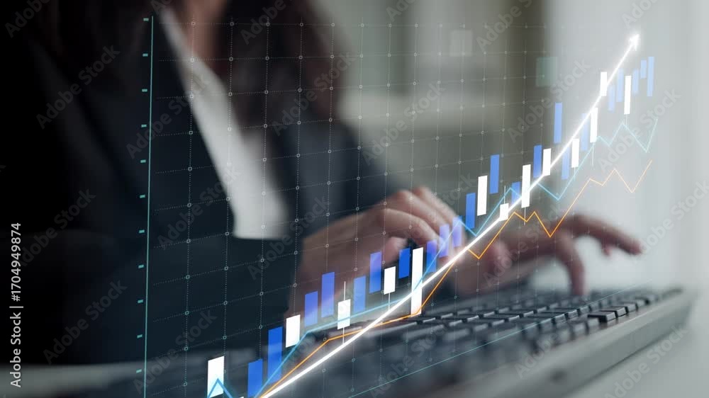 Poster a businesswoman focuses on data trends with a graphical overlay, symbolizing financial growth in a m