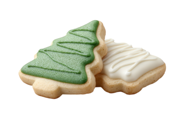 Two christmas tree sugar cookies decorated with green and white icing isolated on transparent background