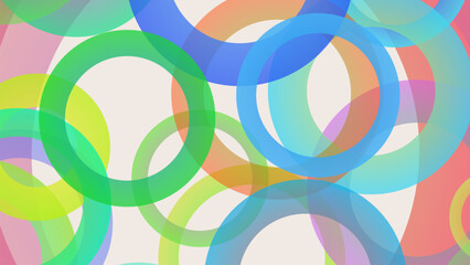 Abstract background of overlapping colorful translucent rings in a playful pattern