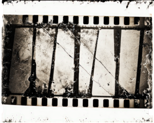 Vintage Film Strip with Scratches and Damage on Transparent Background