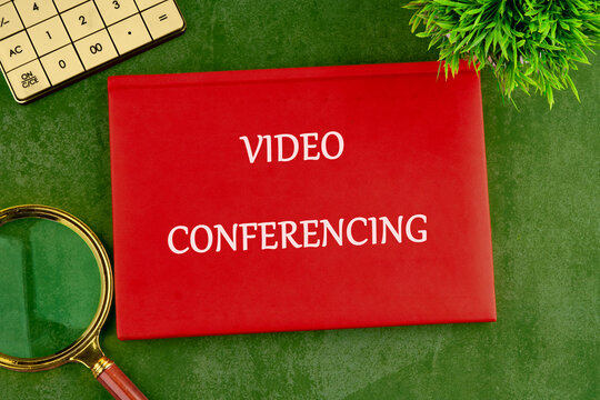 A group of professionals engage in a conference call using advanced video conferencing technology, enhancing communication and teamwork - Powered by Adobe