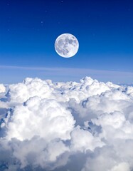 Moonlit cloudscape above, night flight view