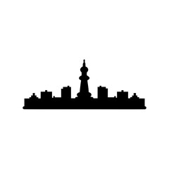 Fototapeta premium City skyline with a unique tower silhouette against a white background