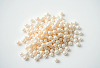 A luminous heap of pearls spills across a pristine white surface, pile, luxury