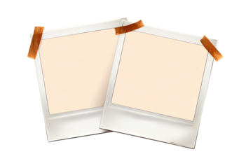 Two blank, overlapping, vintage instant photos