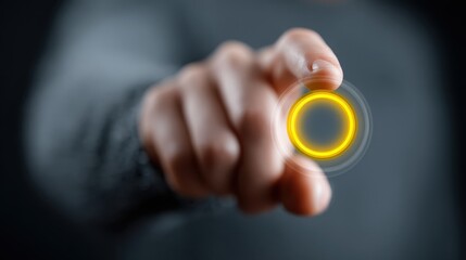 Person presses a digital button with their finger to activate neon circles against a dark background, representing technology and innovation