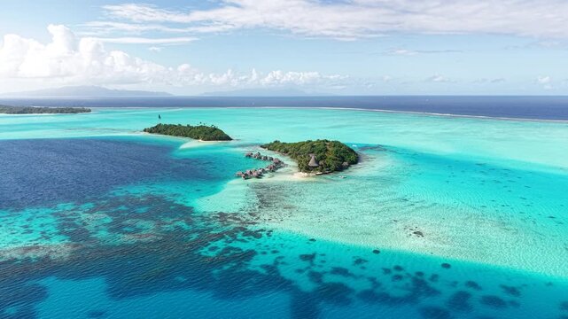 Drone Shot of Bora Bora Lagoon, Islands With Bungalows and Coral Reefs, French Polynesia