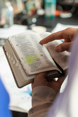 Woman pointing to a bible verse in Psalms