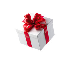 Obraz premium White gift box with red ribbon and bow