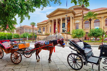 Massimo theater in Palermo and horse carriage