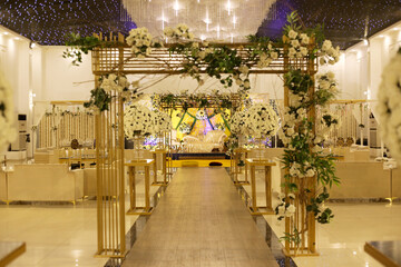 Elegant Event Venue with Floral Arch and Seating