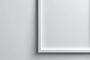 Blank white canvas in modern gray frame displayed on a minimalist wall in a contemporary art gallery setting