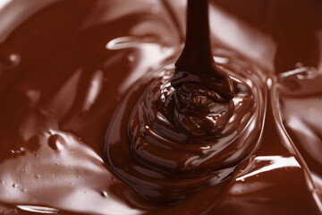 poured melted dark chcolate background closeup