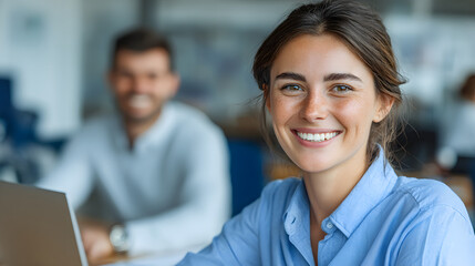 Fototapeta premium Portrait of a Happy Woman Accountant Working in a Modern Office Setting with a Colleague in the Background