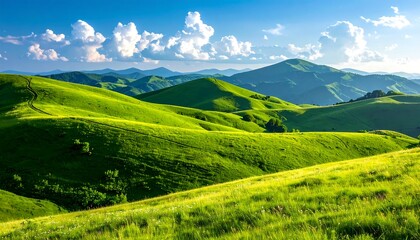 Obraz premium Picturesque Green Hills Under a Sunny Sky.